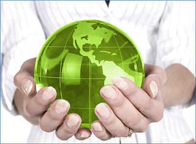 Hands holding a green globe